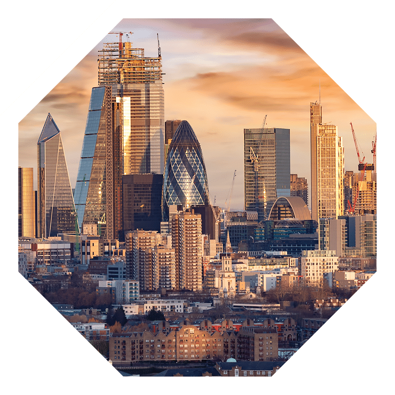 Sunrise over the urban skyline of the City of London, UK, financial district and hub of banking institutions