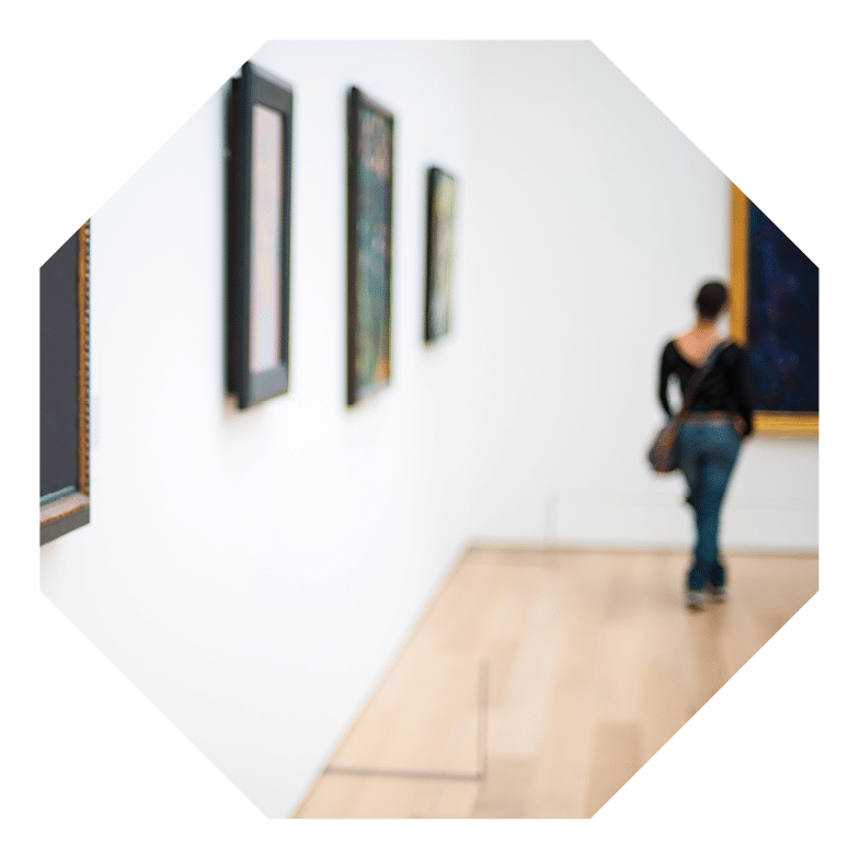 Art gallery with blurred lady in the background
