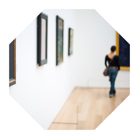 Art gallery with blurred lady in the background