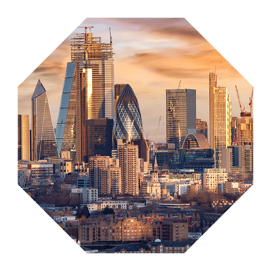 Sunrise over the urban skyline of the City of London, UK, financial district and hub of banking institutions